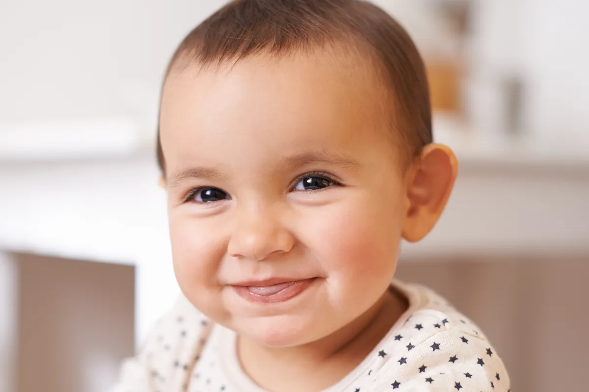 When do babies say their first word?