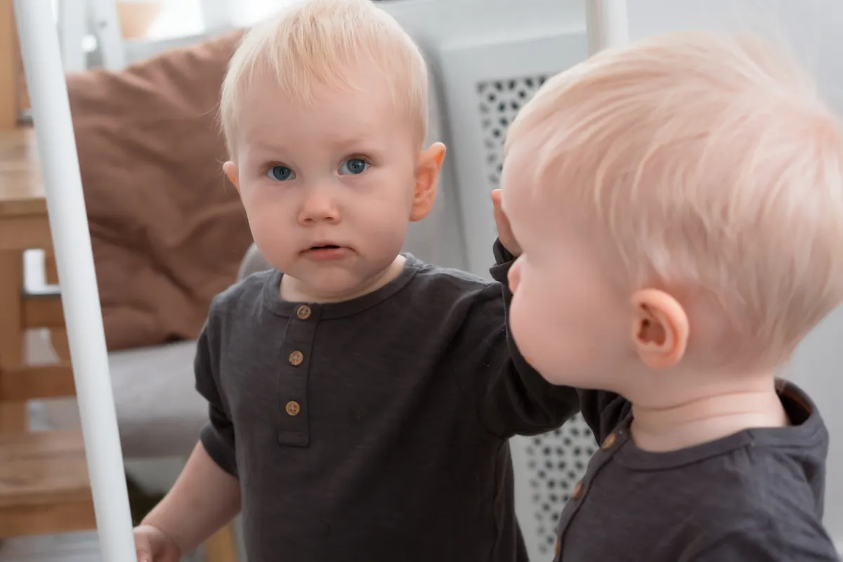 Why are mirrors good for baby’s development?