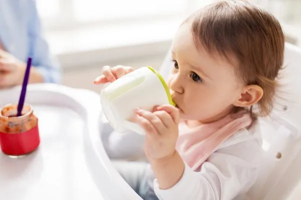 How do I transition my child from a bottle to a cup?